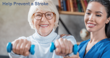 What Can be Done to Prevent a Stroke? Picture of an elderly Caucasian female exercising with light dumbbells in her hands with assistance from a Hispanic female physical therapist.