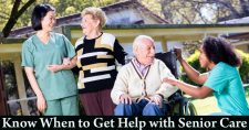 When to Get Help with Senior Care. Picture of an older caucasian male and female with a young asian nursing aide and a young black nursing aide.